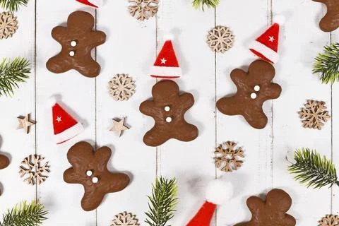 German gingerbread in shape of men glazed with chocolate between Christmas 스톡 사진