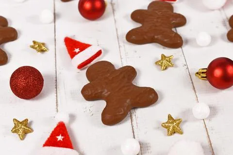 German gingerbread in shape of men glazed with chocolate between Christmas 스톡 사진