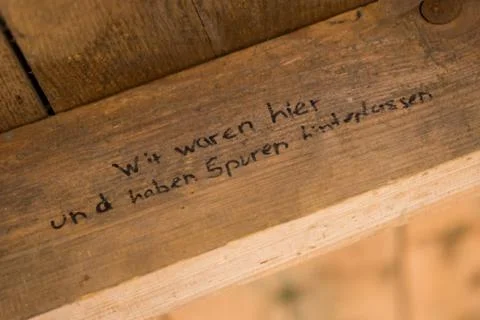 German Graffito "Wir waren hier und haben Spuren hinterlassen" (translation:  Stock Photos