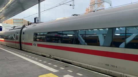 German high speed Deutsche Bahn ICE train departs from Arnhem train station Stock Footage 229813984