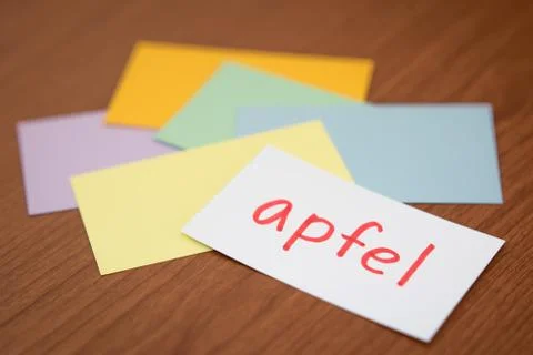 German; Learning New Language with the Flaish Card (Translation; Apple) Stock Photos