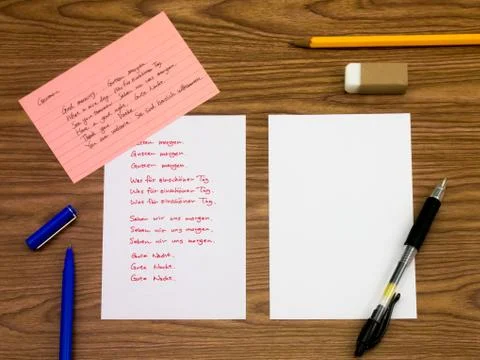 German; Learning New Language Writing Words on the Notebook Stock Photos