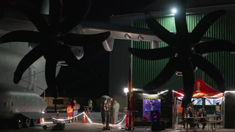 German Luftwaffe A400M crew relaxes under propellers of the Airbus Atlas A400M Stock Footage 327637183