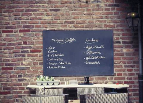 German menu of different dishes on the board in the cafe Stock Photos
