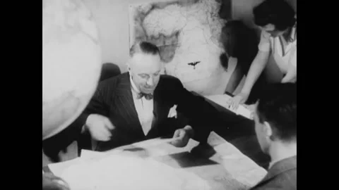 German office workers discussing resources of interest in other countries Stock Footage 140523735