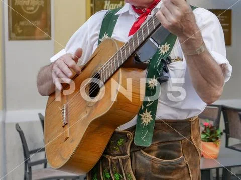 German Oktoberfest style lederhosen clothing and guitar, Munich, Germany, August Stock Photos