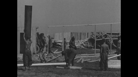 German POW build temporary accomodation Video stock 103380085