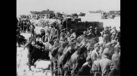 German prisoners of war on beach Stock Footage 44575099