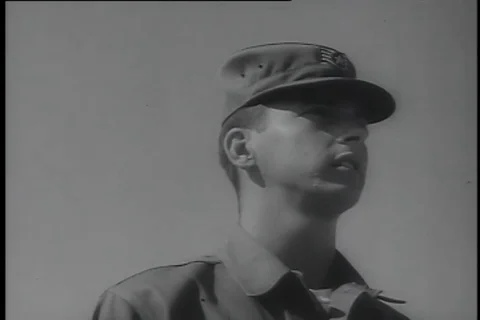 German Shepherd attacks a man during training exercise - 1956 Stock Footage 99094269