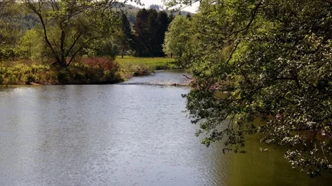 The german sieg river in spring 4k 25fps video Stock Footage 275238728