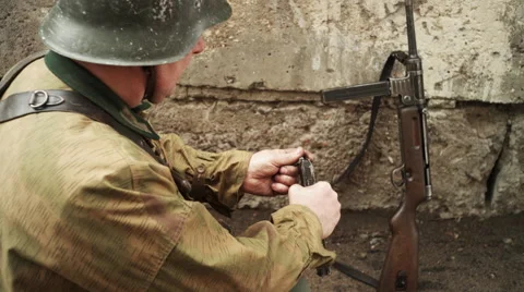 German soldier of war world two submachine gun recharge Video stock 61936352