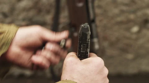 German soldier of war world two submachine gun recharge. Close up Stock Footage 61936736
