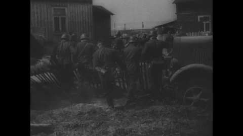 German soldiers dig out bogged truck Stock Footage 103388734