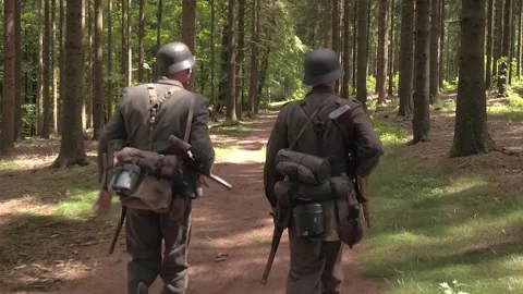 German SS Squad walking through European Forest during World War 2 Stock Footage 325352345