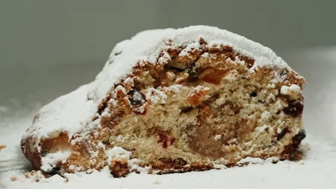 German Stollen bakery dessert close-up. Bun with spices, raisins, nuts and Stock Footage 262088699