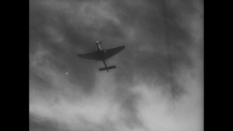 German Stuka dive bombs a Polish town Stock Footage 103388374
