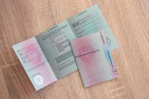 German temporary Permanent resident card lies on wooden table Stock Photos