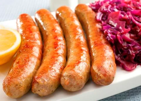 German thuringer bratwurst with red cabbage Stock Photos