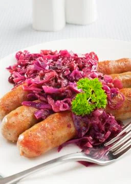 German thuringer bratwurst with red cabbage Stock Photos
