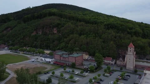 A german town next to a green hill Stock Footage 154486743
