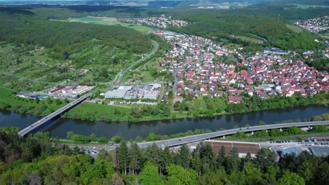 A german town next to a river from above Stock Footage 154416013