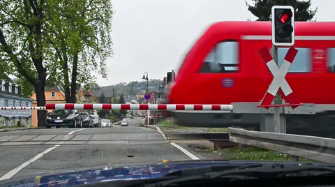 German train passing a railroad crossing in Thuringia, Germany Stock Footage 37282677