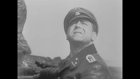 German troops inspect destroyed Allied tanks Stock Footage 103380387