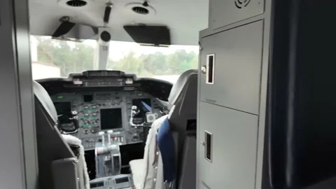 GERMANY - 10.6.2025 - Interior views of a USAF C-21A Learjet are followed by Vídeo Stock 330949806
