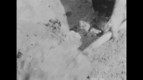 GERMANY - 1936 - Men dig and use explosives to start the process of road Stock Footage 340662154