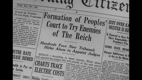 GERMANY - 1936 - in this reenactment, newspapers report that all foreigners Stock Footage 337948428