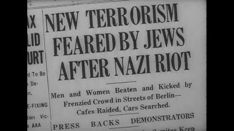 GERMANY - 1938 - Headlines from newspaper articles about Nazi Germany discuss Stock Footage 254199121