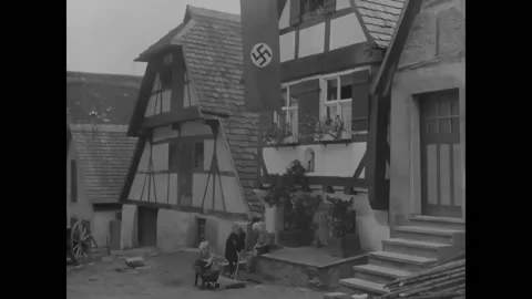 GERMANY - 1938 - Men are assigned jobs in Nazi Germany, many of them in war Stock Footage 296392754