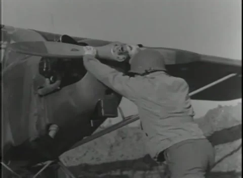 GERMANY - 1944: Bogged aircraft - Aircraft wheel sinks deep in mud Stock Footage 343849113