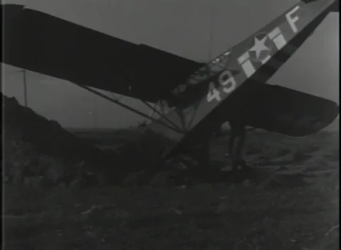 GERMANY - 1944: Bogged aircraft - Aircraft nose sinks into deep mud Stock Footage 343849121