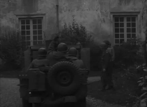 GERMANY - 1944: Command post visit - Armed jeep arrives to command-post salutes Stock Footage 344493235