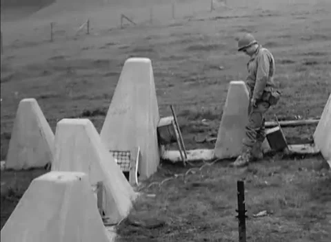 GERMANY - 1944: Engineers - Charge Teams Work Among Concrete Pyramids Stock Footage 344493738