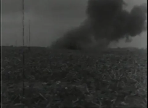 GERMANY - 1944: Mine clearing - Mine vehicle advances beneath smoke Stock Footage 343849102