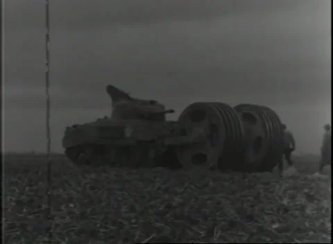 GERMANY - 1944: Mine exploder - M4 tank carries twin disc rollers Video stock 343849100