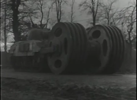GERMANY - 1944: Mine exploder - M4 tank pushes towering mine discs Video stock 343849130