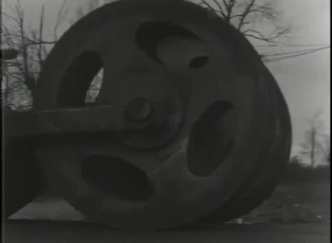 GERMANY - 1944: Roller mechanism - Perforated mine disc turns close-up 库存影片 343849128