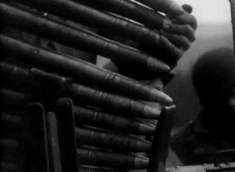GERMANY - 1944: Shell loading - Gloved hands guide shells into gun mount Stock-Footage 344486679