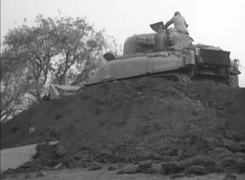 GERMANY - 1944: Siegfried Line route clearing - Dozer opens route Stock Footage 344493825