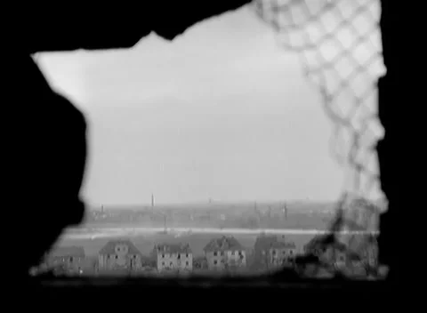 GERMANY - 1945: Assault on a German town - Smoke Above Broken Roofs Vídeo Stock 343849688