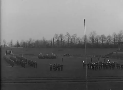 GERMANY - 1945: Brass section - Band and flagpole flank the parade ground Stock Footage 344599017