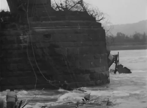 GERMANY - 1945: Bridge Collapse - Boat Holds in the Pier Current Stock Footage 343942544