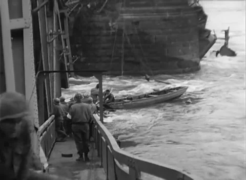 GERMANY - 1945: Bridge Collapse - Boats Work Beside the Pier Stock Footage 343942505