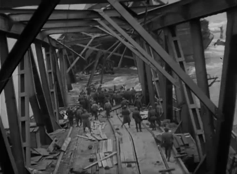 GERMANY - 1945: Bridge Collapse - Column Moves Through Leaning Steel Stock Footage 343942528