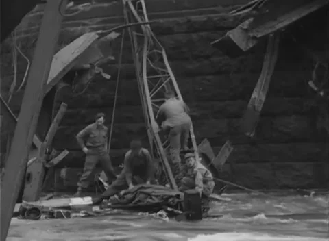 GERMANY - 1945: Bridge Collapse - Crew Climbs the Debris Slope Stock Footage 343942551