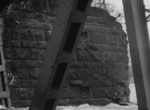 GERMANY - 1945: Bridge Collapse - Girder Lodged Against Stonework Stock Footage 343942501