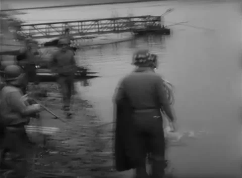 GERMANY - 1945: Bridge Collapse - Rope Team Enters the Shallows Stock Footage 343942512